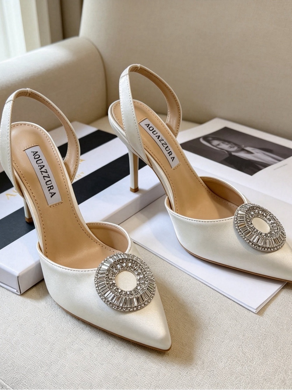 Aquazzura Ivory Satin Pointed Slingback Pumps with Crystal Medallion